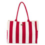 Front view of Sun 'N' Sand red and white vertical striped canvas tote, red woven straps, and side slip pockets.
