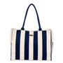 Front view of Sun 'N' Sand navy and cream vertical striped canvas tote, navy woven straps, and side slip pockets.