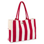 Three-quarter front view of Sun 'N' Sand red and white vertical striped canvas tote, red woven straps, and side pockets.