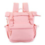Front view of pink Sun 'N' Sand Isla Voyager roll-top backpack featuring matte nylon texture, dual plastic buckles, and zipper.