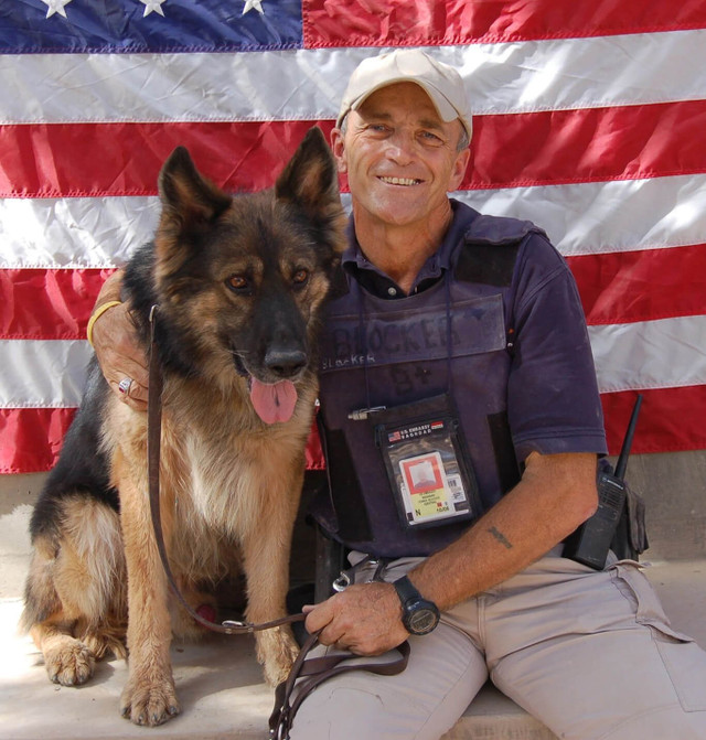 Photo of Dennis Blocker with Dog