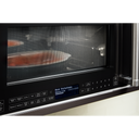 Four à micro-ondes à convection et hotte intégrée KitchenAid® avec mode de friture à air YKMHC319LBS