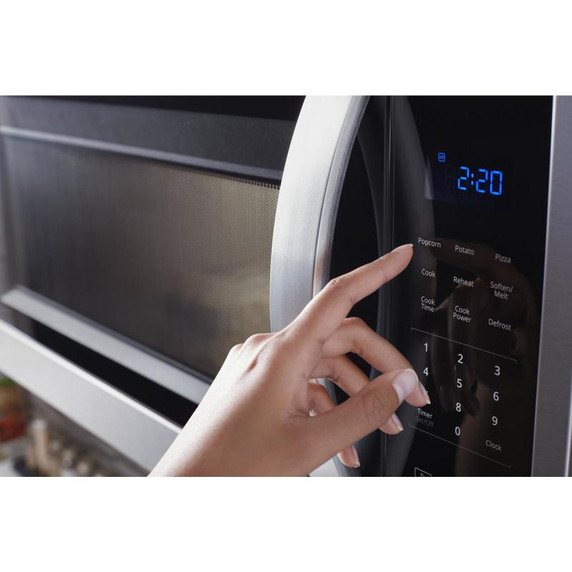Whirlpool® Four à micro-ondes à hotte intégrée avec commandes tactiles électroniques - 900 watts - 1.7 pi cu YWMH31017HS