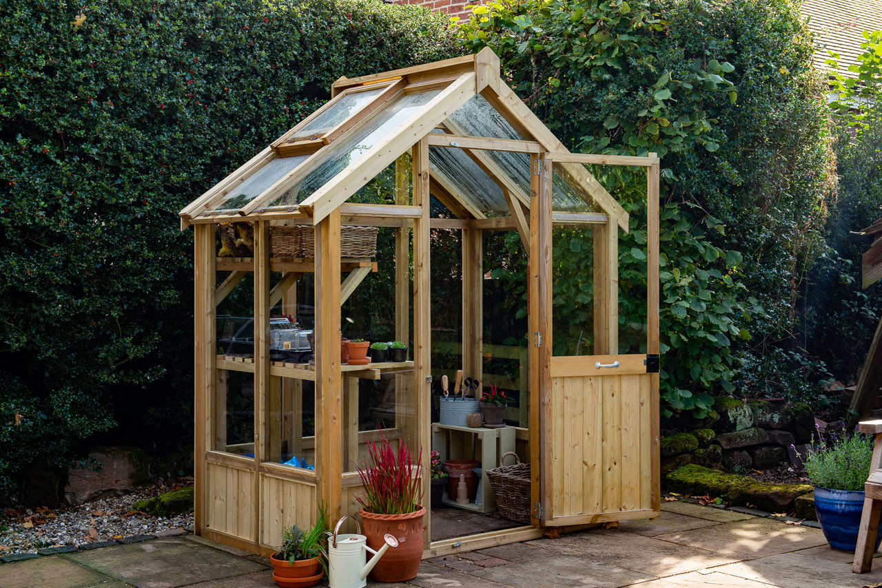 Photograph of Forest Garden Natural Timber Vale Greenhouse - 6x4 (Installed) FSC