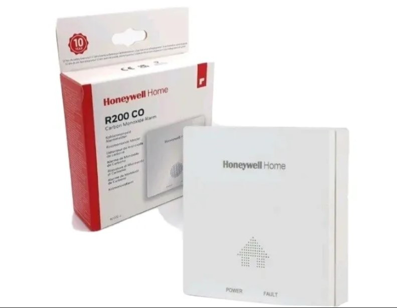 Photograph of HONEYWELL HOME CO ALARM 10 YEAR BATTERY AND WARRENTY R200-C