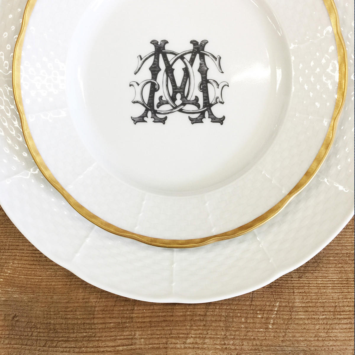 A beautiful addition to your dinnerware collection and to adorn your tablescapes with. It makes the perfect gift for your wedding registry and has the option to include an inscription on back. Choose from their signature font styles or use a custom monogram or crest of your choice! | Sasha NicholasÛªs white porcelain weave dinner plate