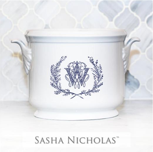 A beautiful addition to your dinnerware collection and to adorn your tablescapes with. It makes the perfect gift for your wedding registry with the included inscription on back. Choose from their signature font styles or use a custom monogram or crest of your choice! | Sasha NicholasÛªs white porcelain champagne bucket