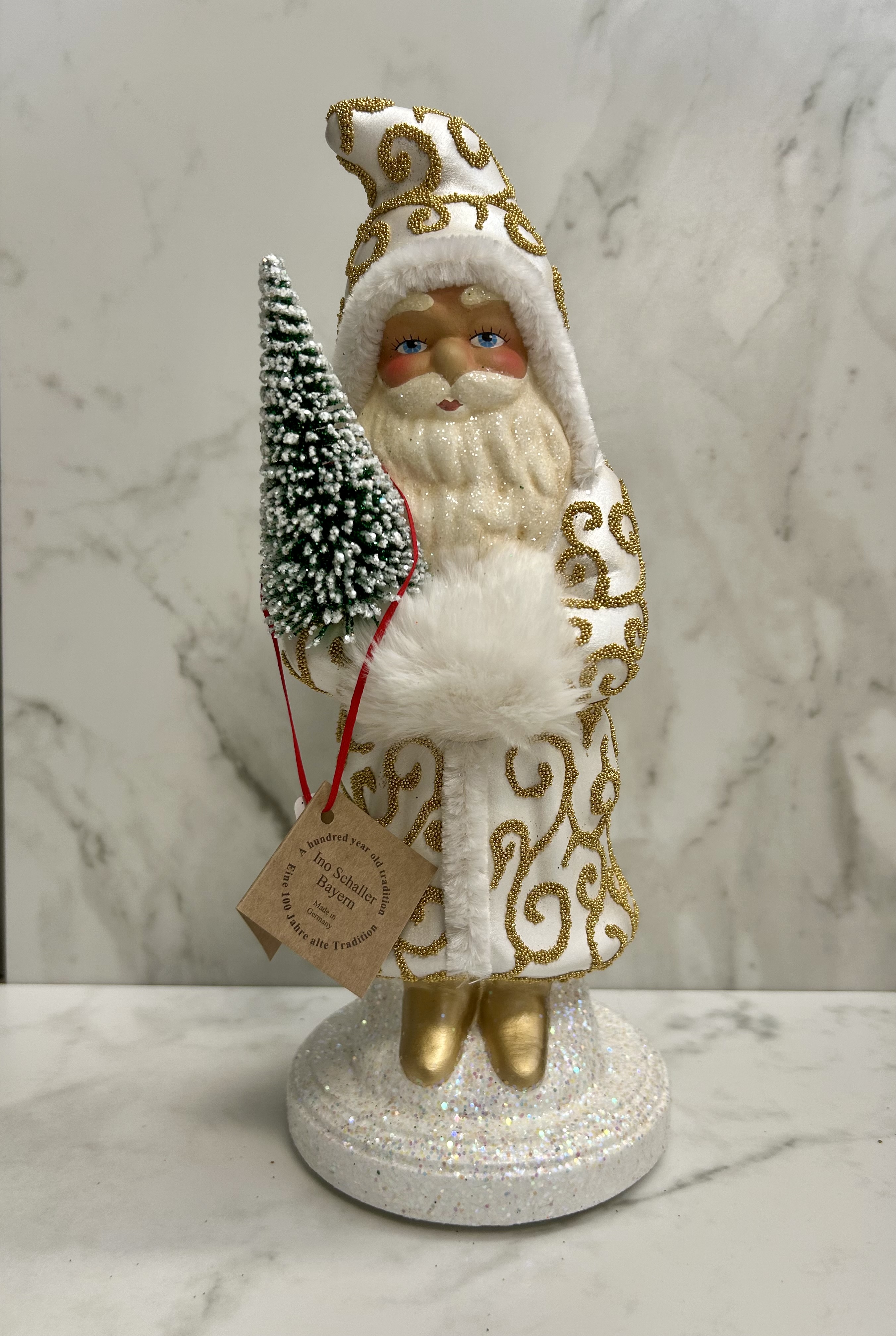 Ino Schaller Santa with Shiny White Coat, Gold Beaded Scroll Detail and Tree | 11.8"