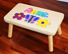 Butterfly and Flower Puzzle Name Stool, shown with jewel letters