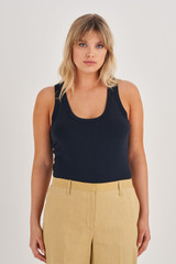 Profile view of model wearing the Oroton Knit Tank in North Sea and 83% Viscose, 17% Polyester for Women