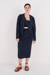 Profile view of model wearing the Oroton Stitch Detail Cardi in North Sea and 83% Viscose, 17% Polyester for Women