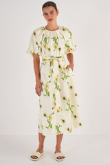 Profile view of model wearing the Oroton Field Daisy Silk Dress in String and 100% Silk for Women