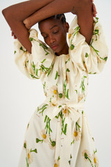 Profile view of model wearing the Oroton Field Daisy Silk Dress in String and 100% Silk for Women