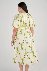 Profile view of model wearing the Oroton Field Daisy Silk Dress in String and 100% Silk for Women