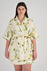 Profile view of model wearing the Oroton Field Daisy Print Robe in String and 100% Linen for Women
