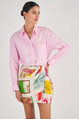 Profile view of model wearing the Oroton Ticket Print Sarong in Fuchsia and 100% Silk for Women