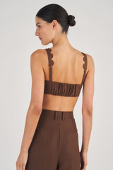 Profile view of model wearing the Oroton Scallop Bralette in Dark Chocolate and 100% Linen for Women