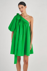 Profile view of model wearing the Oroton One Shoulder Gathered Dress in Meadow and 100% Cotton for Women