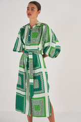 Profile view of model wearing the Oroton Bandana Print Dress in Garden and 100% Silk for Women