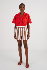Profile view of model wearing the Oroton Capri Stripe Short in Iced Chocolate and 100% Linen for Women