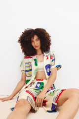 Profile view of model wearing the Oroton Sardinia Print Camp Shirt in Multi and 100% Silk for Women