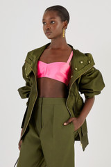 Profile view of model wearing the Oroton Satin Bralette in Candy Pink and 85% Polyester, 15% Silk for Women