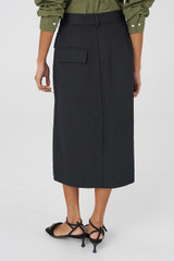 Profile view of model wearing the Oroton Tailored Midi Skirt in Black and 100% Cotton for Women