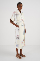 Profile view of model wearing the Oroton Patch Label Long Robe in Lemon Zest and 100% Linen for Women