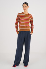 Profile view of model wearing the Oroton Merino Long Sleeve Stripe Crew Knit in Wicker and 100% Merino Wool for Women