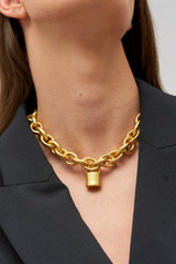 Profile view of model wearing the Oroton Evie Necklace in Worn Gold and Brass Base With 18CT Gold Plating for Women