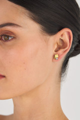 Profile view of model wearing the Oroton Leora Cluster Studs in Worn Gold/Silver/Clear and Brass base metal with precious metal plating/stone for Women