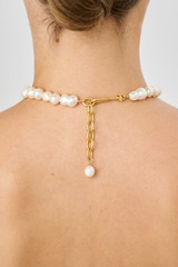 Profile view of model wearing the Oroton Marlee Necklace in Worn Gold/White and Brass for Women . IP:4