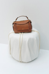 Detail product shot of the Oroton Mica Bowler in Brandy and Premium pebble grain leather for Women . IP:21