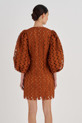 Profile view of model wearing the Oroton Lace Dress in Tan and 100% Polyester for Women