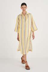 Profile view of model wearing the Oroton Stripe Dress in Daisy and 100% Silk for Women