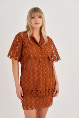 Profile view of model wearing the Oroton Short Sleeve Lace Over Shirt in Tan and 100% Polyester for Women