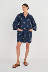 Profile view of model wearing the Oroton Anchor Print Dress in North Sea and 100% Cotton for Women