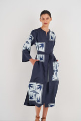 Profile view of model wearing the Oroton Scarf Print Dress in North Sea and 100% Silk for Women