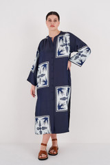 Profile view of model wearing the Oroton Scarf Print Dress in North Sea and 100% Silk for Women