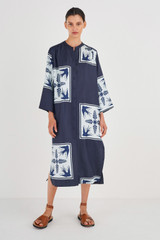 Profile view of model wearing the Oroton Scarf Print Dress in North Sea and 100% Silk for Women