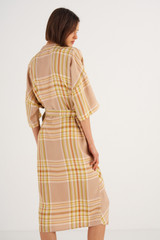 Profile view of model wearing the Oroton Check Shirt Dress in Camel Check and 100% Viscose for Women