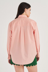 Profile view of model wearing the Oroton Poplin Long Sleeve Shirt in Primrose and 100% Cotton for Women