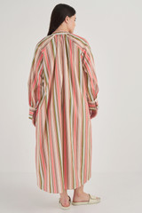 Profile view of model wearing the Oroton Garden Party Stripe Dress in Primrose and 100% Cotton for Women