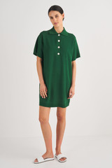 Profile view of model wearing the Oroton Mesh Polo Shift Dress in Treehouse and 83% Viscose, 17% Polyester for Women