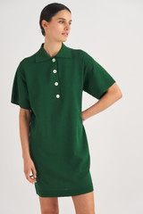Profile view of model wearing the Oroton Mesh Polo Shift Dress in Treehouse and 83% Viscose, 17% Polyester for Women