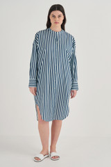 Profile view of model wearing the Oroton Long Sleeve Stripe Shirt Dress in North Sea and 100% Cotton for Women