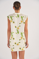 Profile view of model wearing the Oroton Field Daisy Tunic in String and 100% Silk for Women
