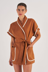 Profile view of model wearing the Oroton Contrast Bind Robe in Brandy and 100% Linen for Women