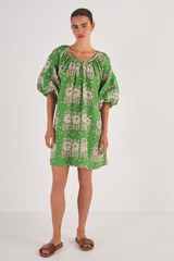 Profile view of model wearing the Oroton Full Sleeve Posie Print Dress in Garden and 100% Linen for Women
