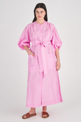 Profile view of model wearing the Oroton Column Shirt Dress in Bright Foxglove and 100% Silk for Women